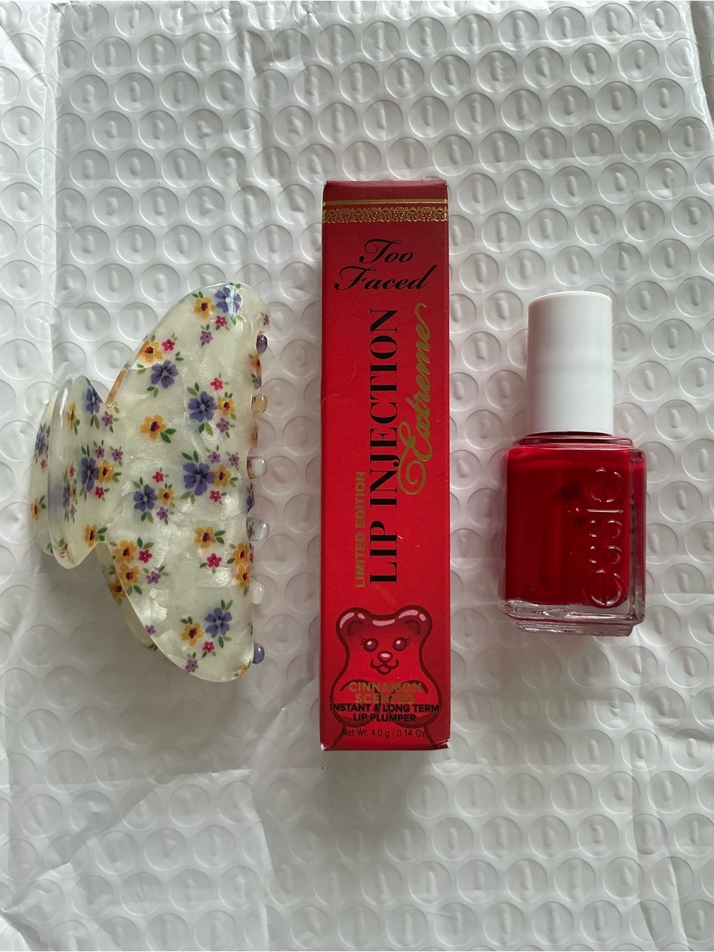 Too Faced Lip Injection Extreme Cinnamon Bear & red Essie polish